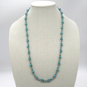 Necklace with Turquoise stones and silver accents. Lobster clasp.